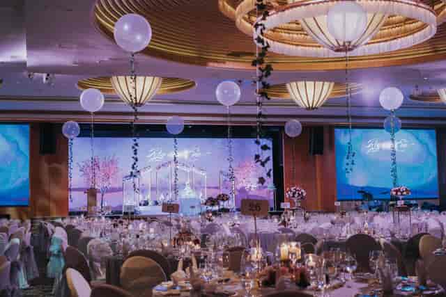 Grand Ballroom at Ritz-Carlton Singapore, elegant setup for weddings and galas.