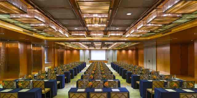 Oriental Ballroom at Mandarin Oriental, Singapore, set for a corporate event with floral decor.