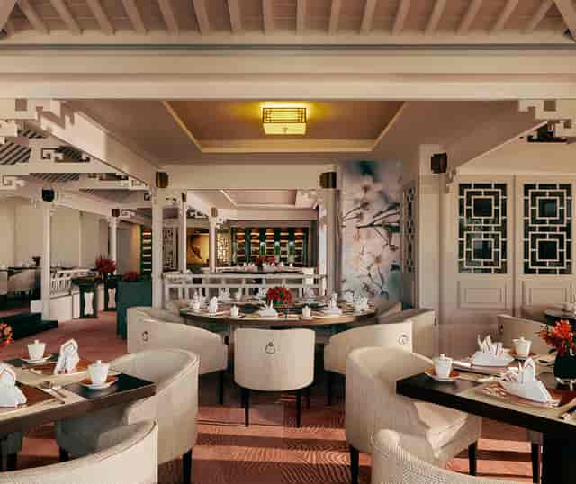 Elegant dining space at Mandarin Oriental, Singapore for intimate meetings and events.