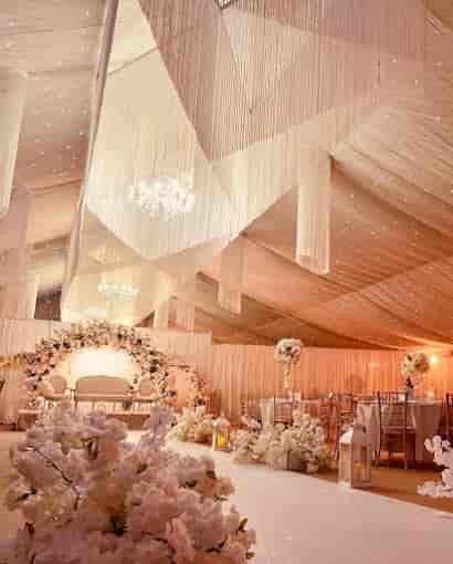 Elegant Grand Marquee event space with soft drapery, perfect for weddings and upscale gatherings.