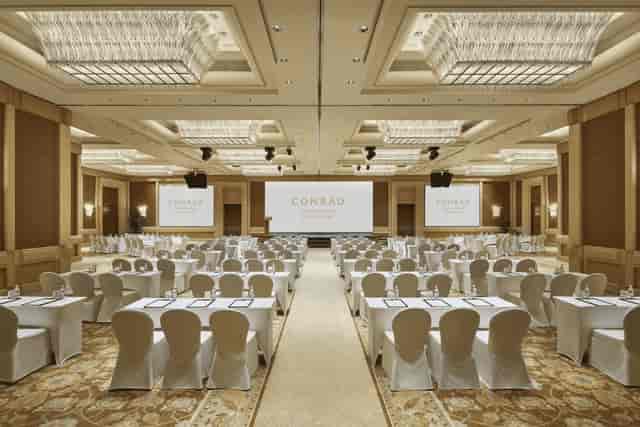 Conference room at Conrad Centennial Singapore, elegant decor for corporate events.