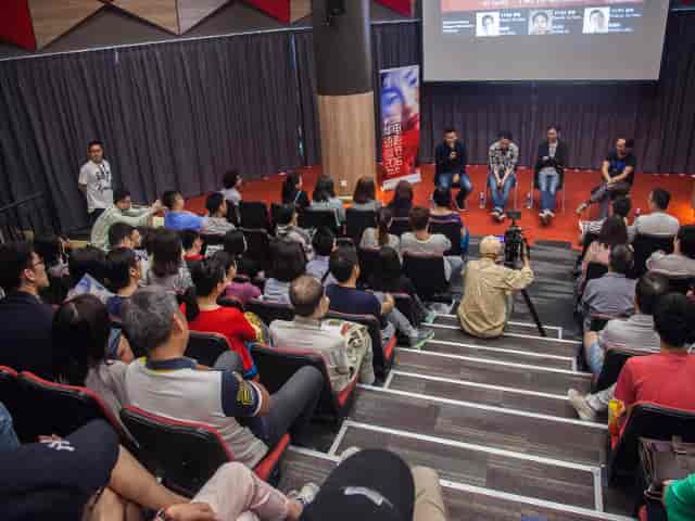 Panel discussion in Main Hall at *SCAPE, featuring engaged speakers and audience interaction.