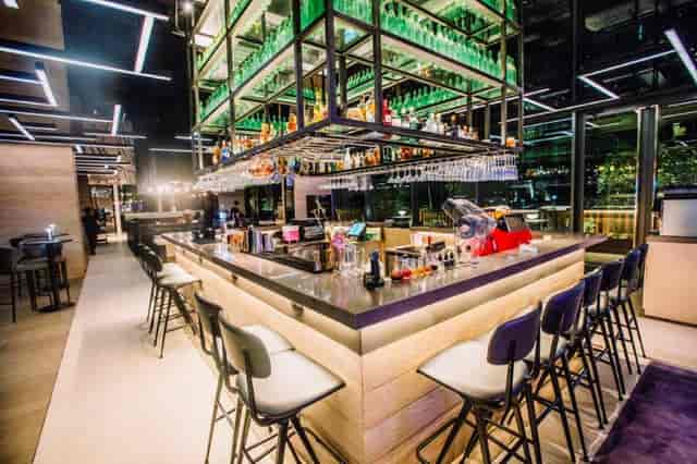 Modern bar area in YOTEL Singapore, ideal for networking events and cocktail receptions.