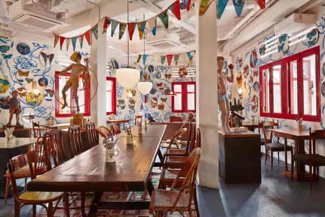 Vibrant event space with colorful decor for creative meetings and team-building events.
