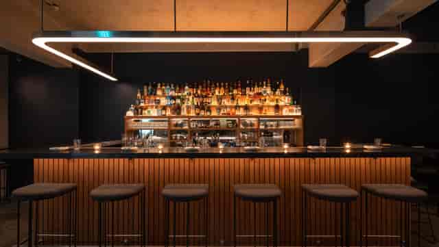 Sleek bar setup in LUMO Restaurant, ideal for networking events and cocktail receptions.