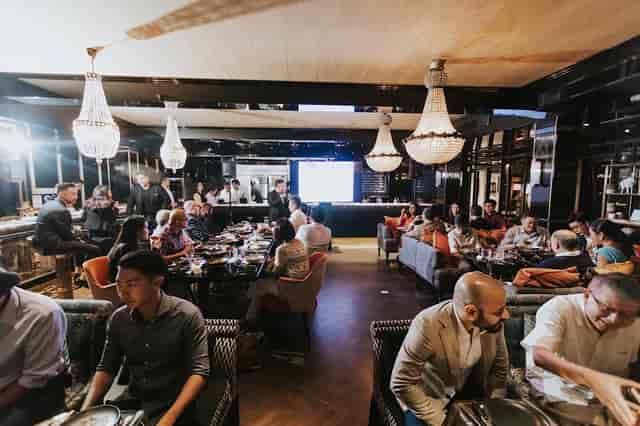 Elegant lounge event at Siri House with ambient lighting, perfect for corporate gatherings.