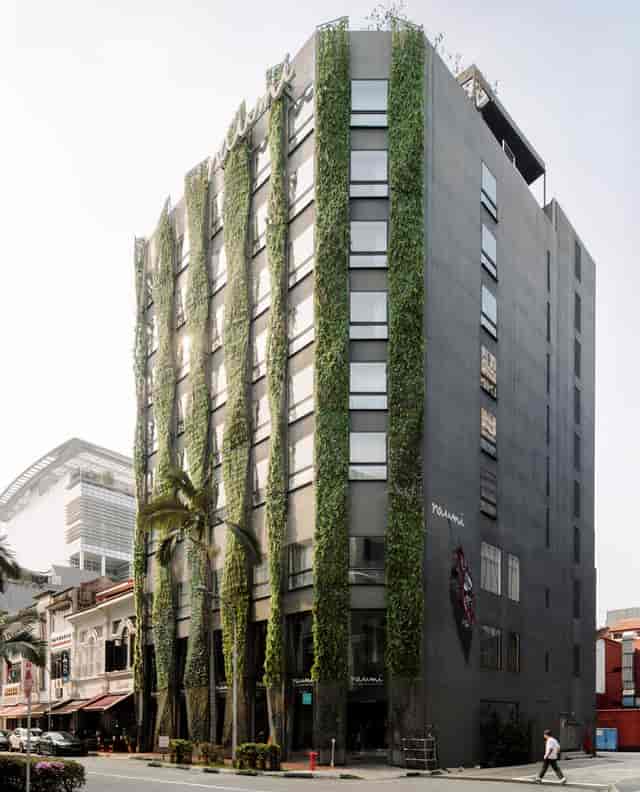 Modern wedding venue at Naumi Hotel Singapore with striking green facade, ideal for eco-friendly events.
