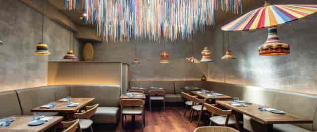 Vibrant Lima bar interior with colorful decor, ideal for social events and gatherings.