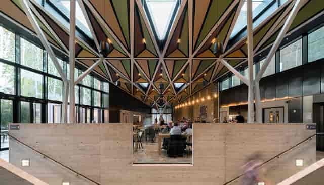 Modern event space with geometric ceiling at Square Chapel Arts Centre for meetings and gatherings.