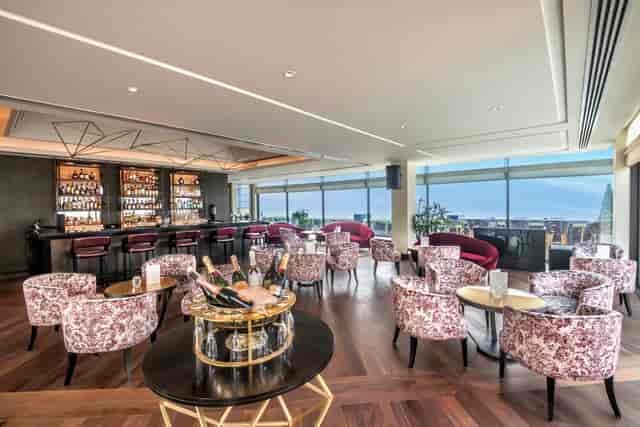Elegant event space at The Oberoi, New Delhi with panoramic views for cocktail receptions.
