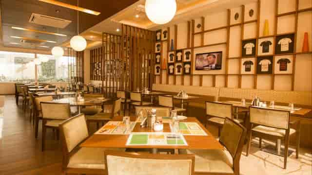 Restaurant in Lemon Tree Hotel Gurugram, modern decor, ideal for meetings and events.