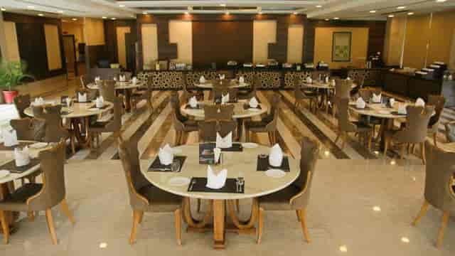 Elegant dining area at Udman Hotels, perfect for events and meetings.