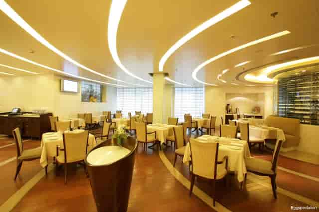 Modern cafe in Jaypee Siddharth with elegant decor, perfect for events and gatherings.