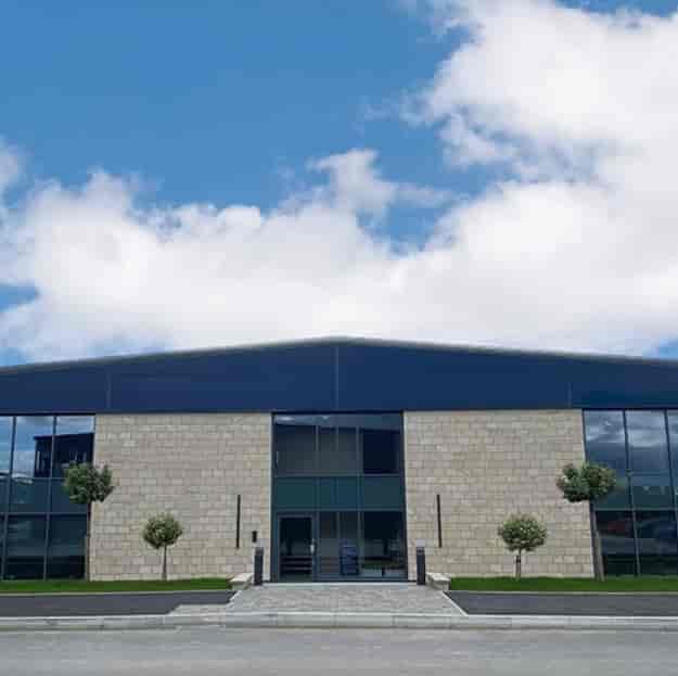 Modern conference suite with large windows, perfect for corporate meetings and events.