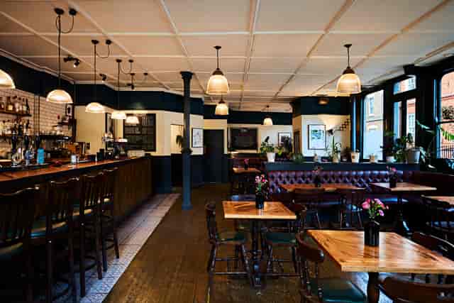 The Royal Oak venue with banquette seating, ideal for corporate networking and team events.