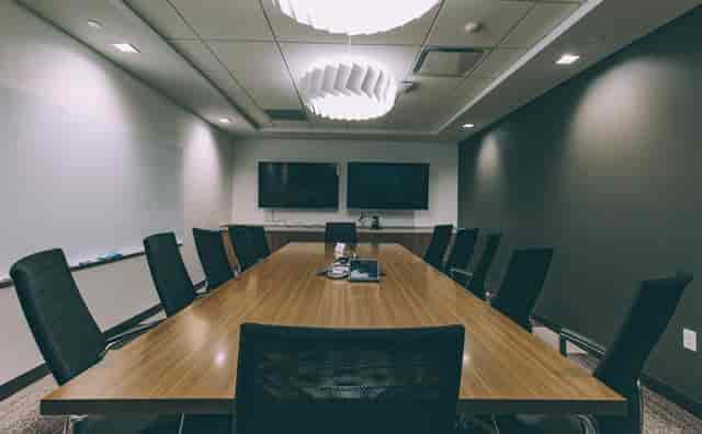 Modern conference room in Cambridge, MA with ergonomic chairs for professional meetings.