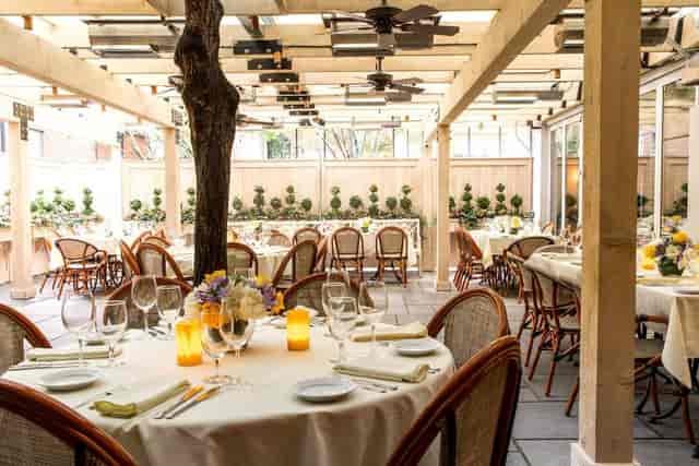 Elegant outdoor dining space at Harvest restaurant, perfect for events and celebrations.