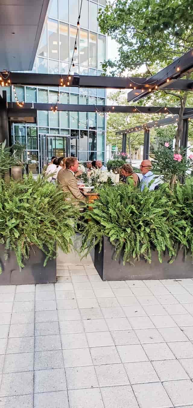 Sophisticated outdoor dining setup at Catalyst Restaurant, ideal for corporate events.