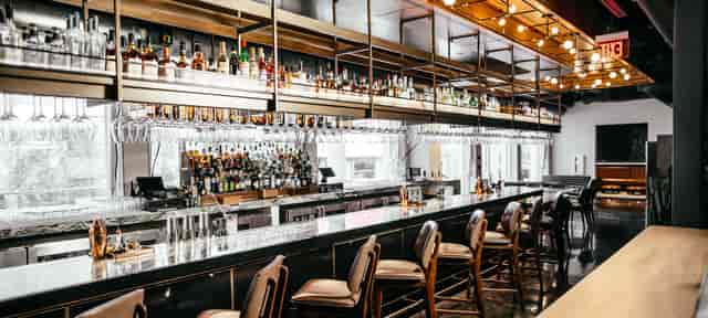 Modern bar setup in The Exchange Food Hall for networking events and cocktail receptions.