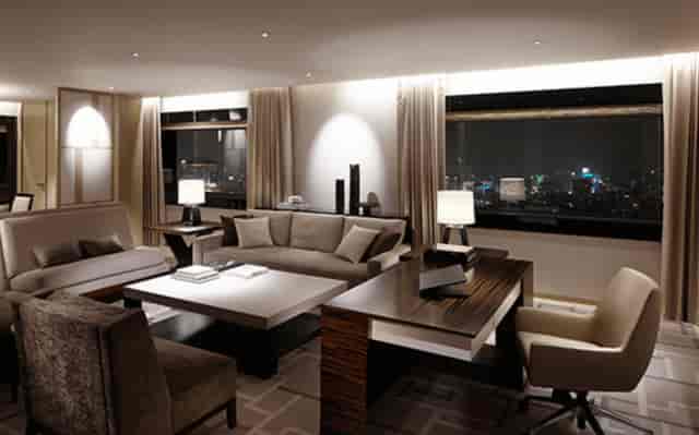 Sophisticated PRISMHALL meeting suite with modern decor and city view for events.