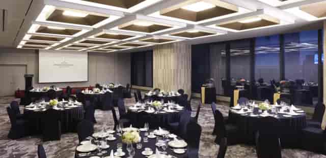 Azalea Room at InterContinental Grand Seoul Parnas, elegant dinner setup for corporate events.