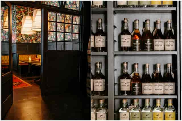 Stylish cocktail bar with floral wallpaper, perfect for networking events and gatherings.