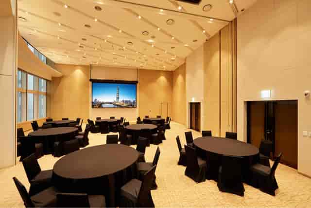 Conference Room at SKY31 Convention with round tables, ideal for meetings and events.