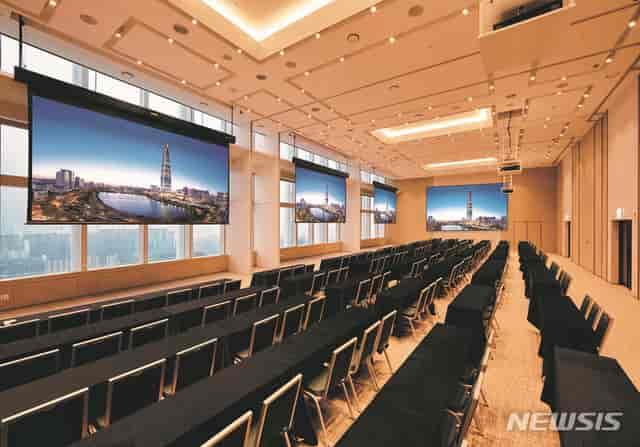 Modern conference room with panoramic windows for corporate meetings and seminars.