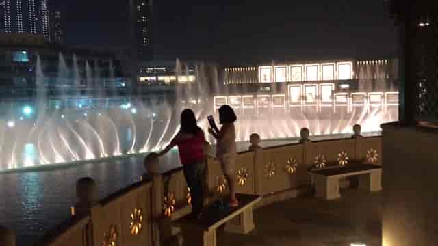 "Palace Hotel Downtown Viewing Deck with illuminated fountain, perfect for events and gatherings."