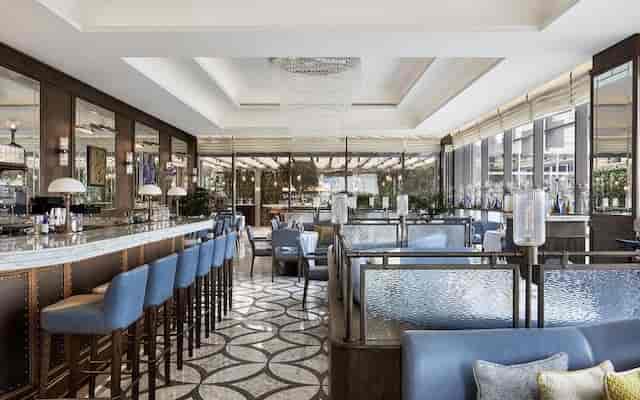 Elegant bar area in Four Seasons Hotel Dubai, ideal for upscale meetings and events.