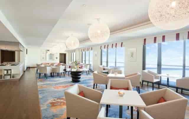 Modern conference hall at JA Ocean View Hotel, ideal for meetings and events.