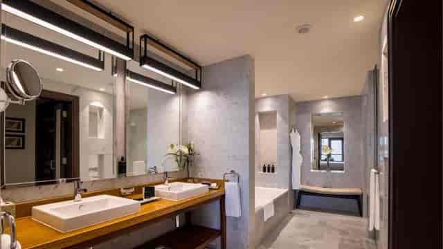 Fayruz Meeting Room bathroom at Amwaj Rotana, modern design for events and meetings.