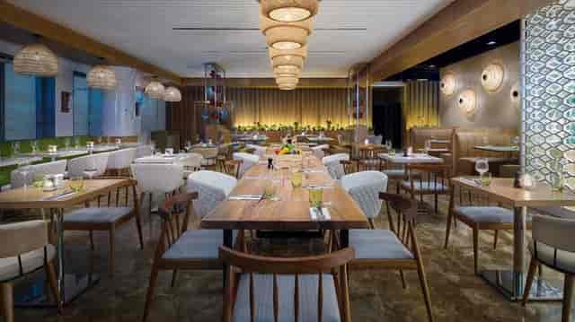 Modern restaurant with elegant decor, ideal for intimate gatherings and corporate events.