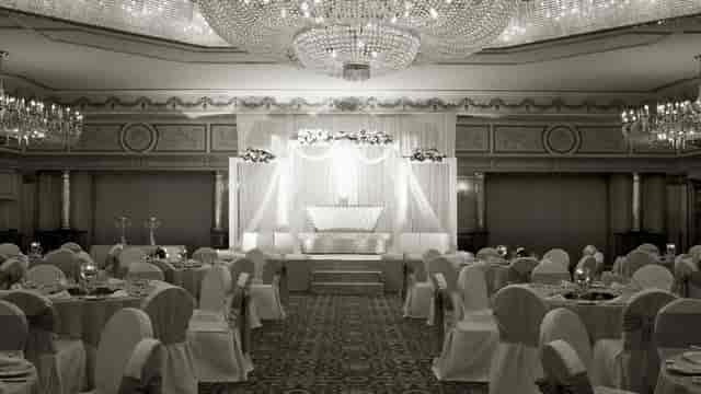 Elegant ballroom at Le Meridien, ideal for weddings and formal events with chandeliers.