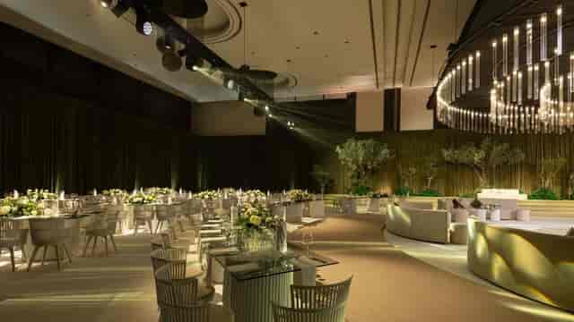Elegant ballroom at Le Meridien with floral centerpieces for corporate events and gatherings.