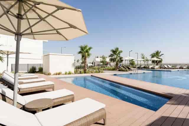 Birdie by the pool at Radisson Hotel Dubai, ideal for casual meetings and networking events.