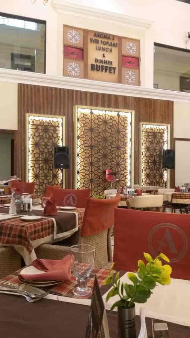 Rooftop bar at Hotel Aroma with elegant decor, perfect for events and meetings.