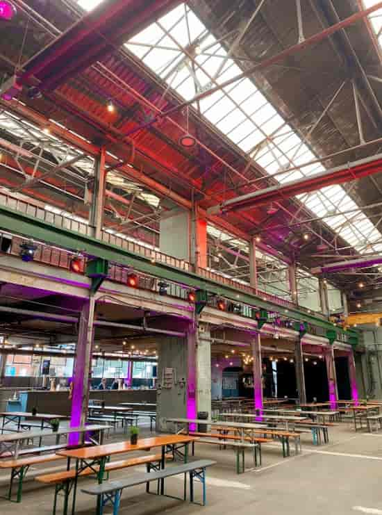 Spacious industrial venue with high ceilings for events and gatherings in The Steamworks.