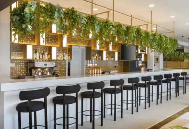 Modern bar area with sleek design at Leonardo Hotel Manchester Piccadilly for events.
