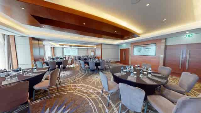 Boardroom at Kempinski Hotel, elegant tables for corporate events and meetings.