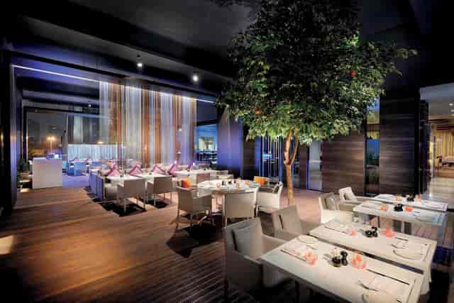 Modern dining space at Roberto's with elegant table settings for upscale events.