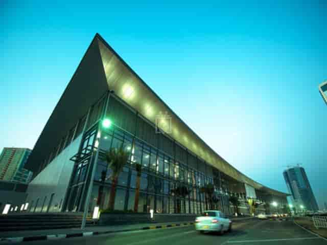 Press Lounge at Expo Centre Sharjah, modern venue with glass facade for events and conferences.