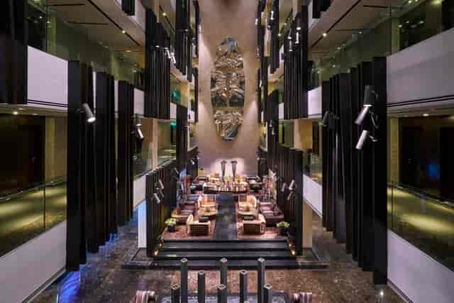 Multifunctional Meeting Room at The Canvas Hotel, elegant atrium for upscale events.