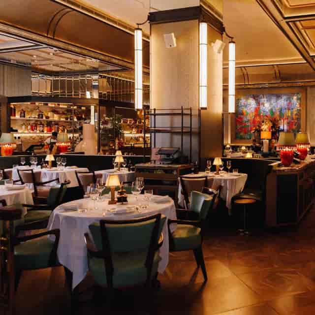 Elegant dining space in Alaya for upscale events and corporate dinners.