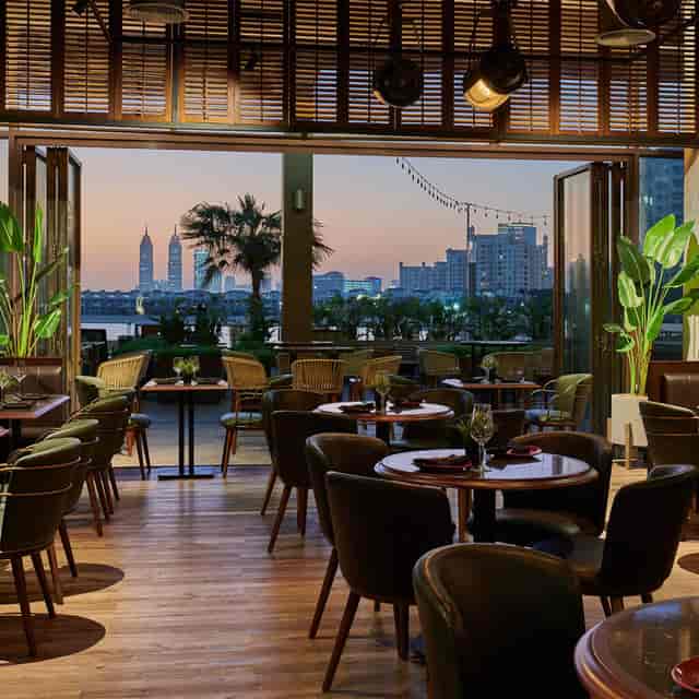 Private dining room at The Tap House with skyline view, perfect for events and meetings.