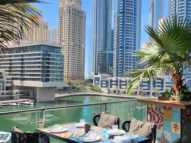 Lounge at Mama Zonia: waterfront venue with modern skyline for upscale events.