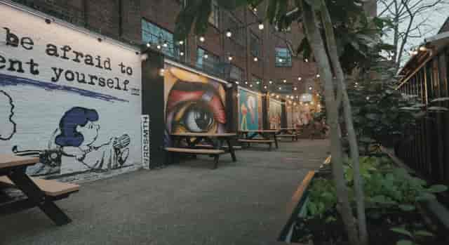 Arch 3 Rivington St: Urban event space, murals, string lights, cocktail reception, networking