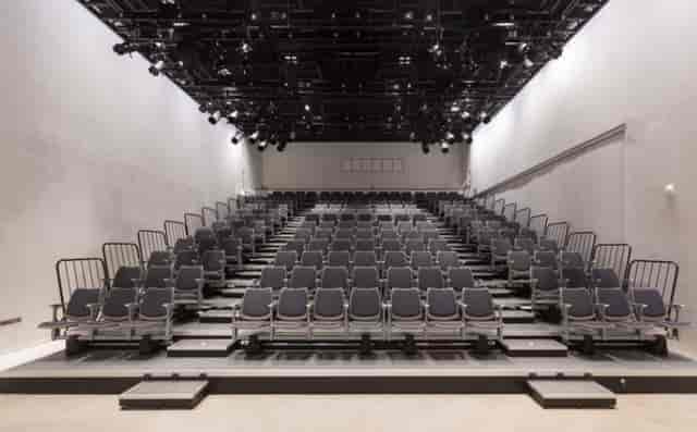 Tiered seating in Platform L venue, ideal for conferences and lectures.
