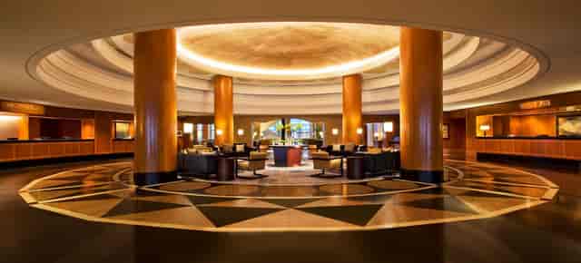 Elegant Sheraton Grand Chicago Riverwalk lobby, ideal for networking events and meetings.