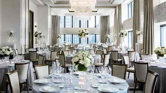 Elegant event space at The Langham, Chicago with floral centerpieces for weddings and galas.